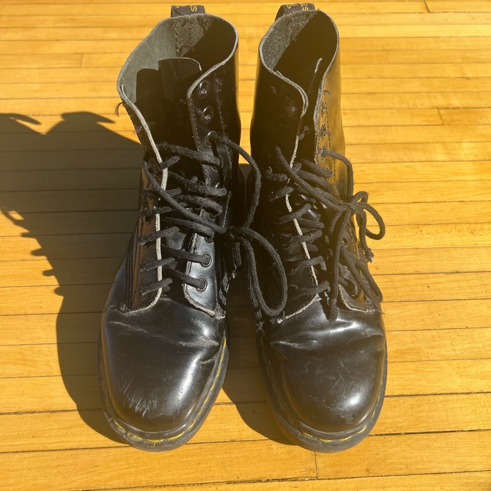 Dr. Martens Black Ankle Boots with Lace-Up Design and Thick Sole